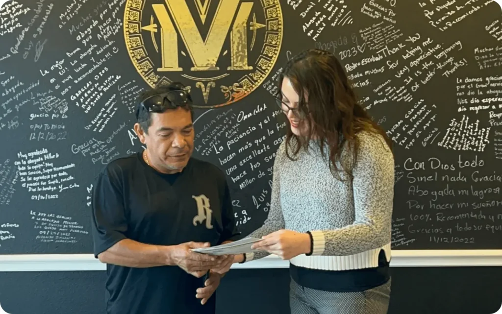 Vergara Miller Law Lawyer talking to client